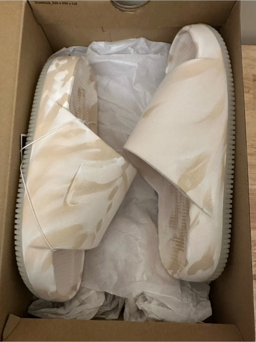 Nike Calm Slide SE in Cream and Tan Marbled Print